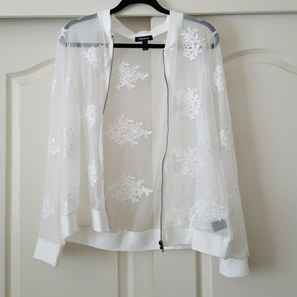 Sheer white jacket with floral overlay